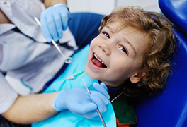 Child receiving dental exam