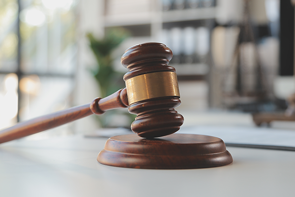 wooden gavel on a desk