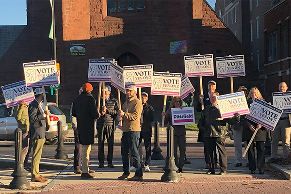 People holding signs