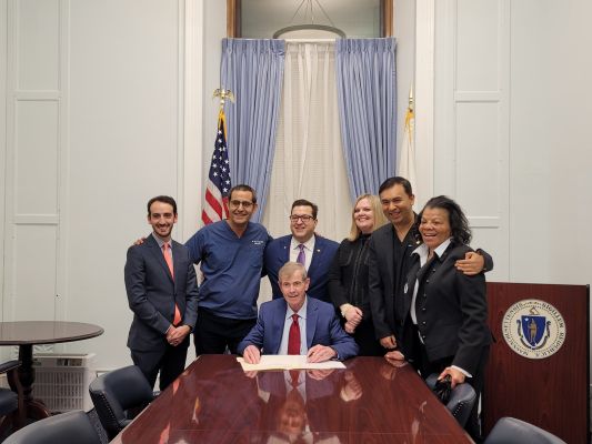 MDS leaders at law signing ceremony